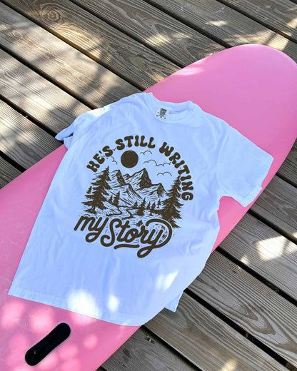 He's Still Writing My Story Shirt | Christian Women's Comfort Colors® Graphic Tee